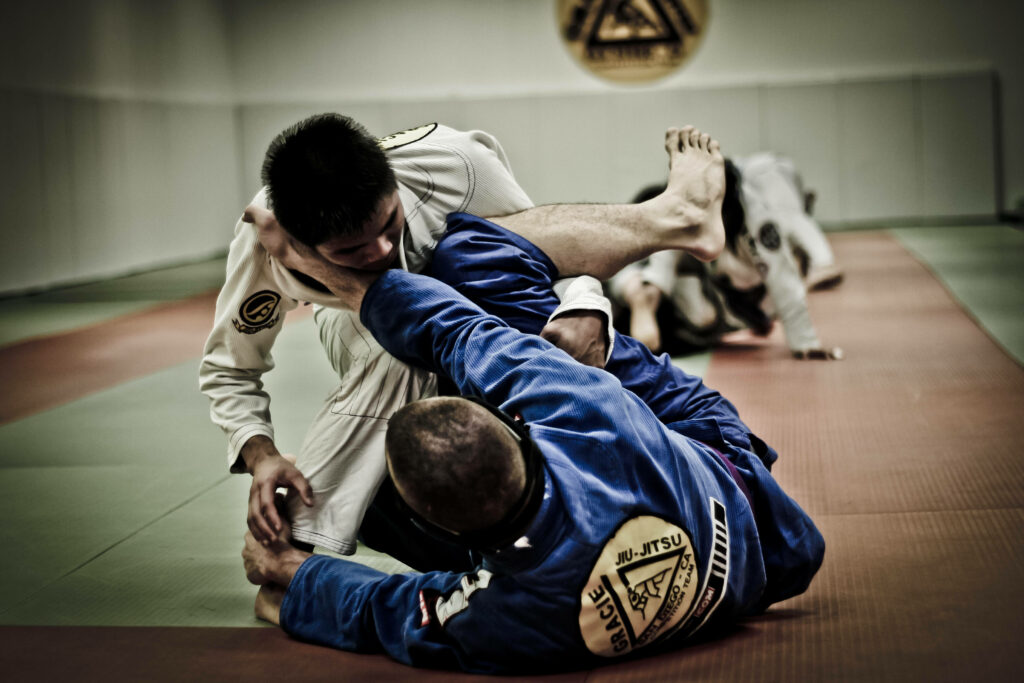 Dynamic Brazilian Jiu-Jitsu Wallpaper: Intense Grappling Techniques