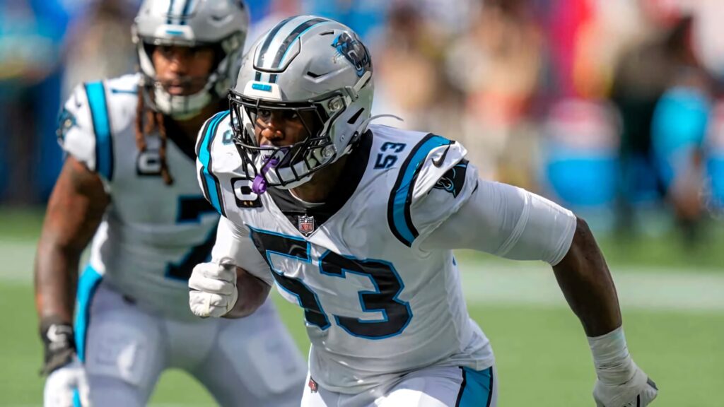 Brian Burns Carolina Panthers in white blue uniform number 53 intense NFL gameplay action wallpaper