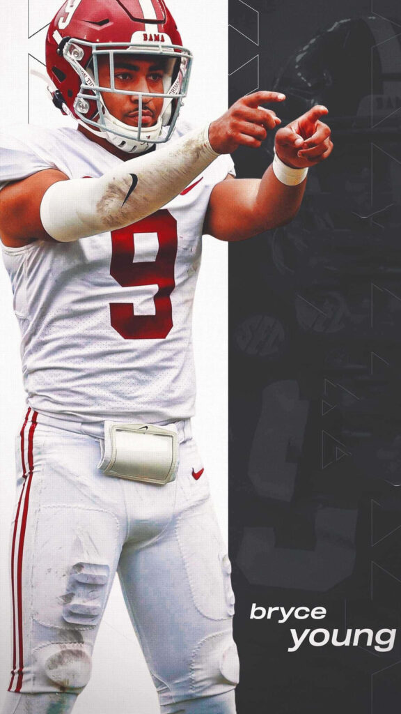 Bryce Young Alabama quarterback in bold red white uniform posing confidently football wallpaper