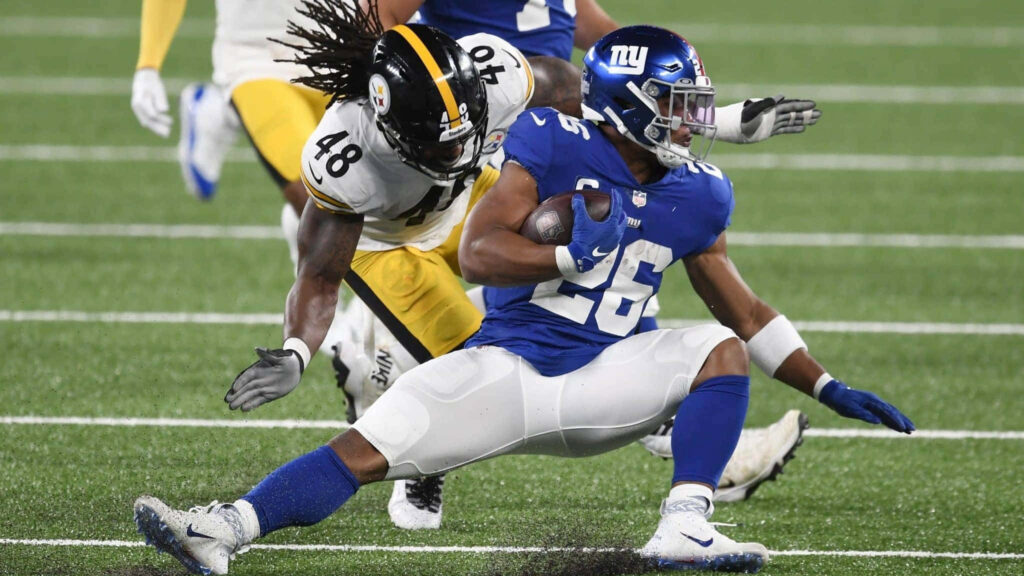 Exciting Bud Dupree Football Action Wallpaper Background
