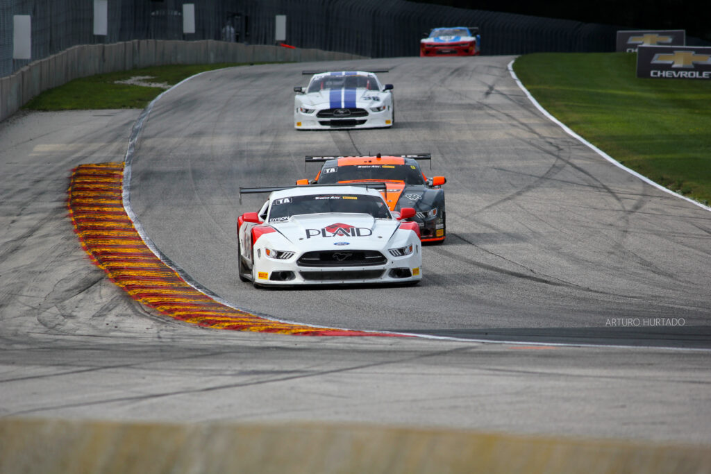 Exhilarating Car Race Wallpaper: Ford Mustang on Winding Track