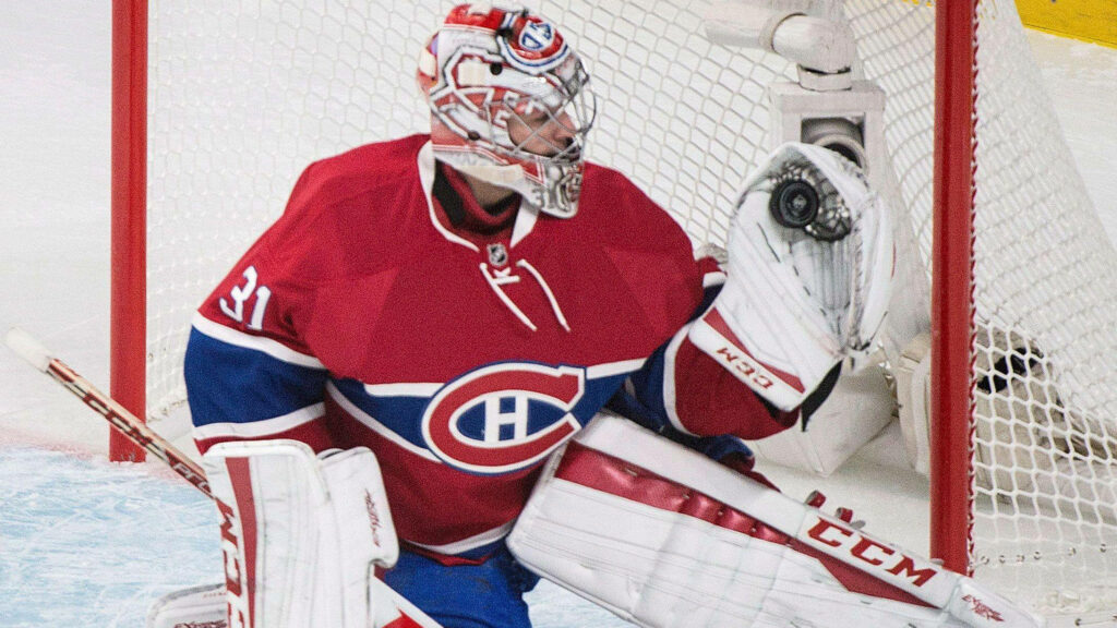 Dynamic Carey Price Wallpaper: Goalkeeping Action for Canadiens Fans