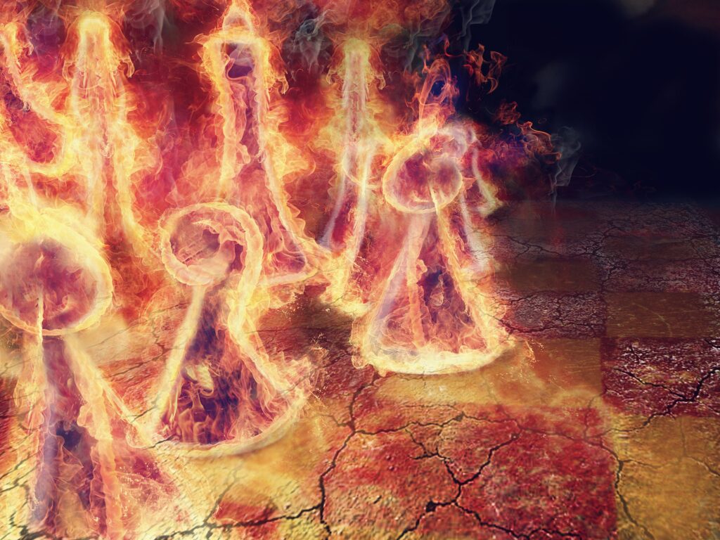 Intense Chess Battle Wallpaper: Flames & Strategy on a Fiery Board