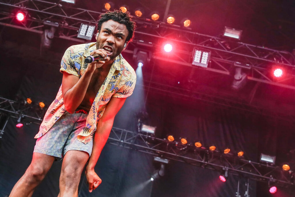 Dynamic Wallpaper: Childish Gambino Energetically Performing on Stage