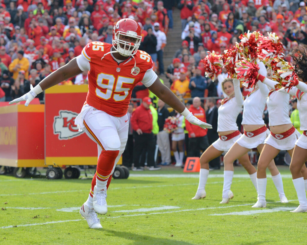 Dynamic Chris Jones Wallpaper: Action-Packed Football Background