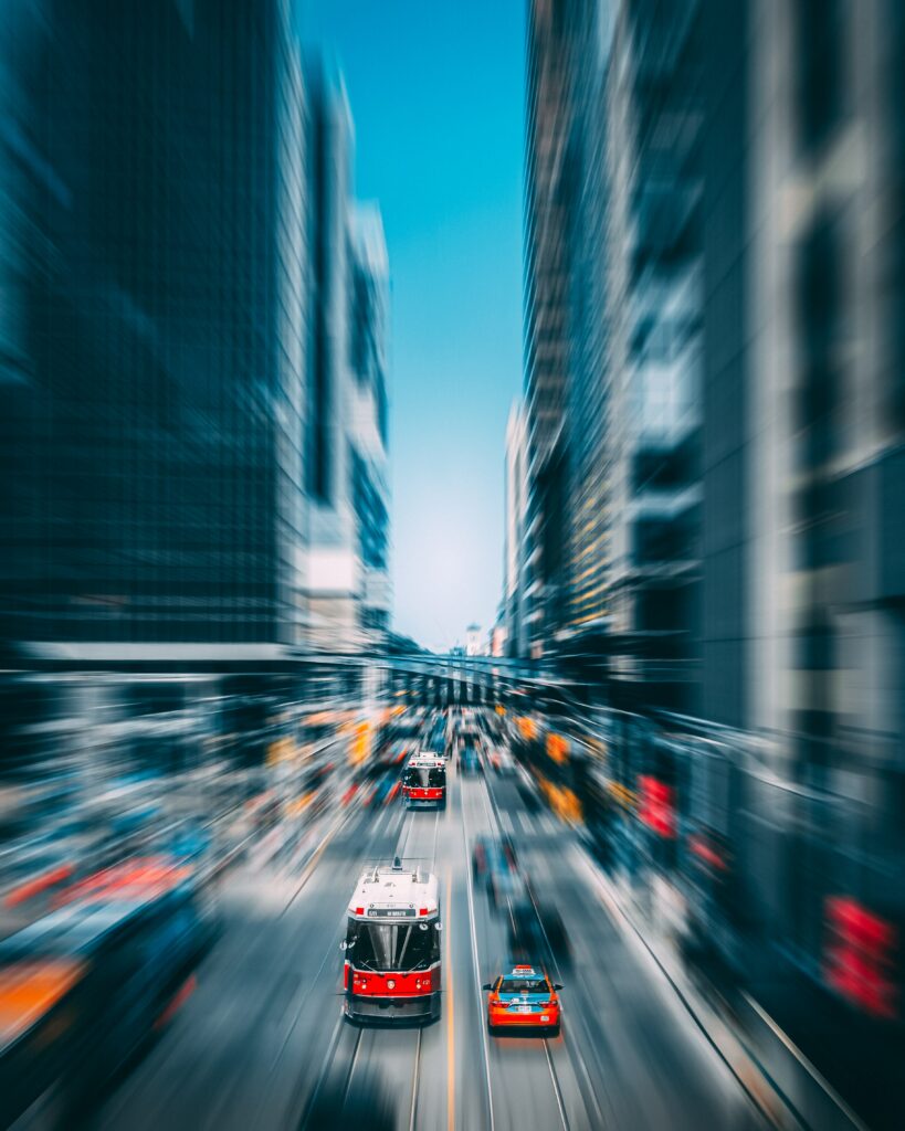 Vibrant City Wallpaper: Dynamic Traffic & Skyscrapers in Motion