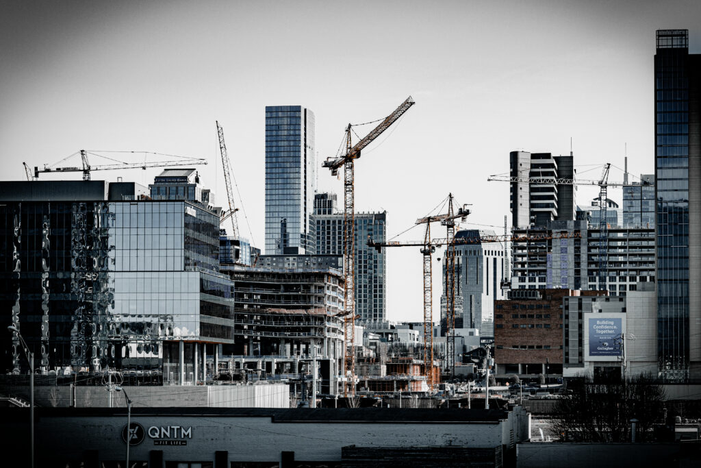 Dynamic Cityscape Wallpaper: Modern Buildings & Urban Construction