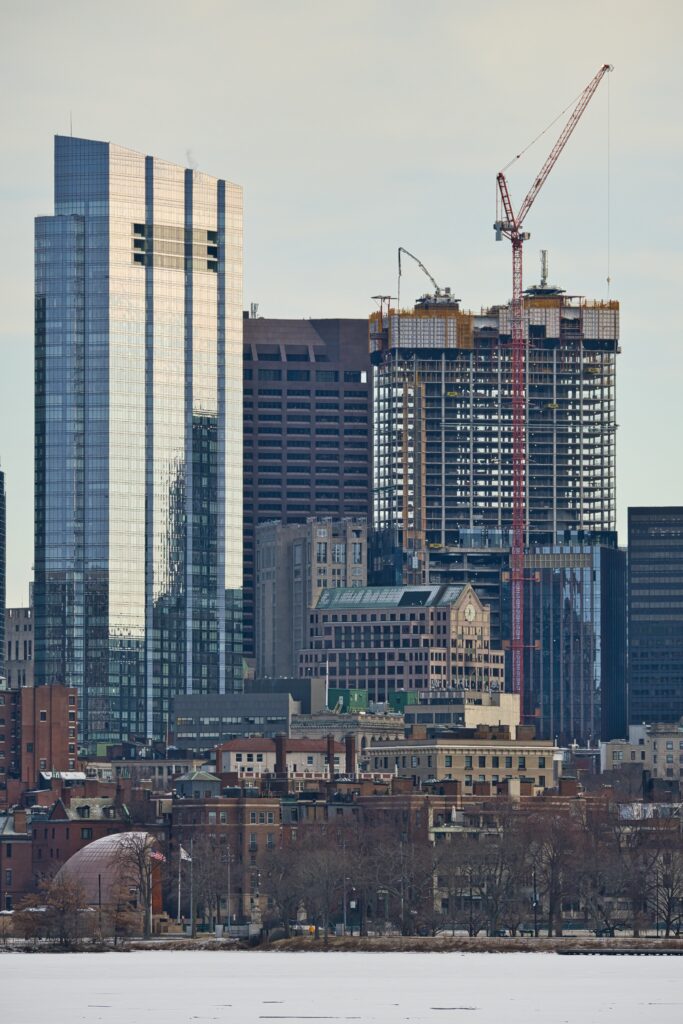 Dynamic Cityscape Wallpaper: Modern Skyscrapers & Construction Scene