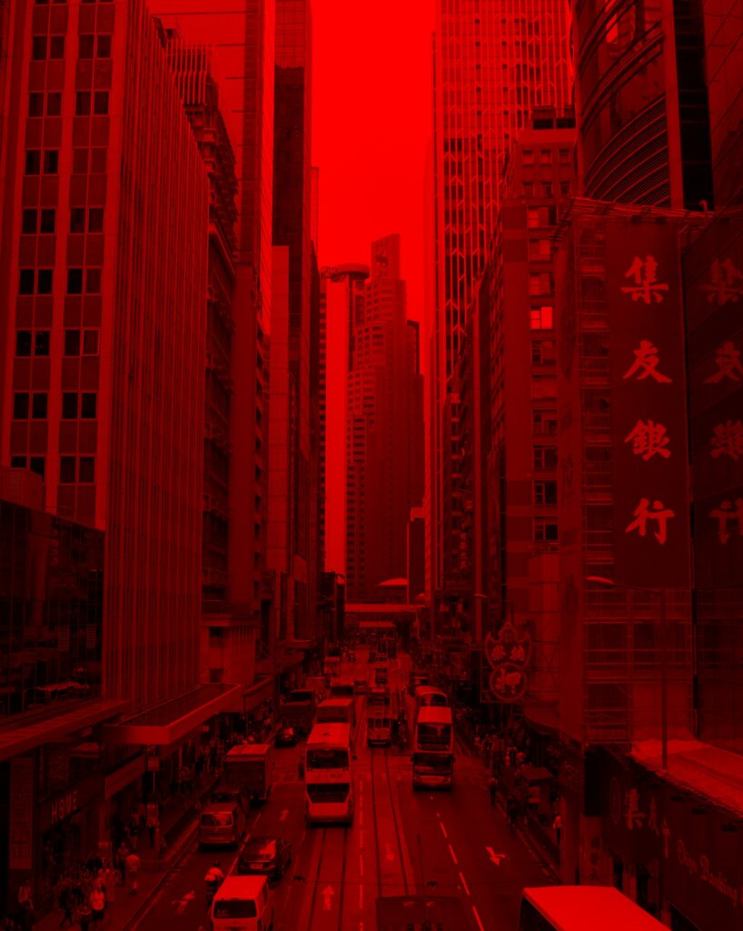 Dynamic Cityscape Wallpaper with Striking Red Overlay Effect