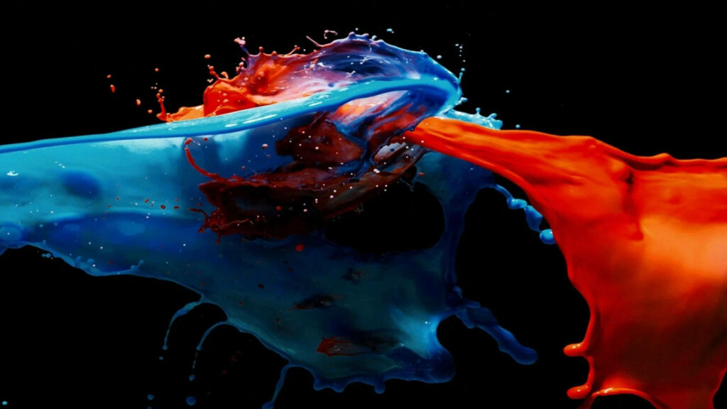 Colorful Clash: Vibrant Blue and Red Midair Collision - HD Tablet Background Wallpaper