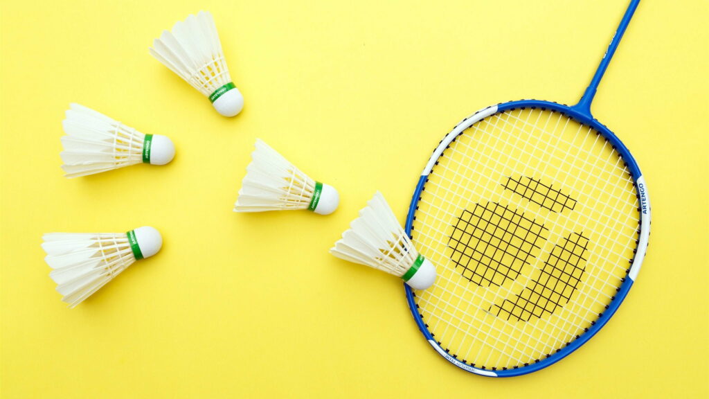 Sporty Elegance: Closeup Snapshot of a Badminton Racket, ideal for QHD wallpaper or Background