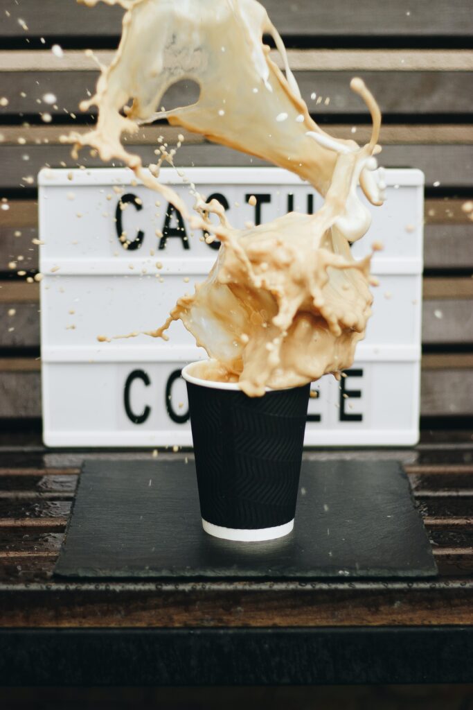 Dynamic Coffee Splash Wallpaper: Stunning Mid-Air Artistry