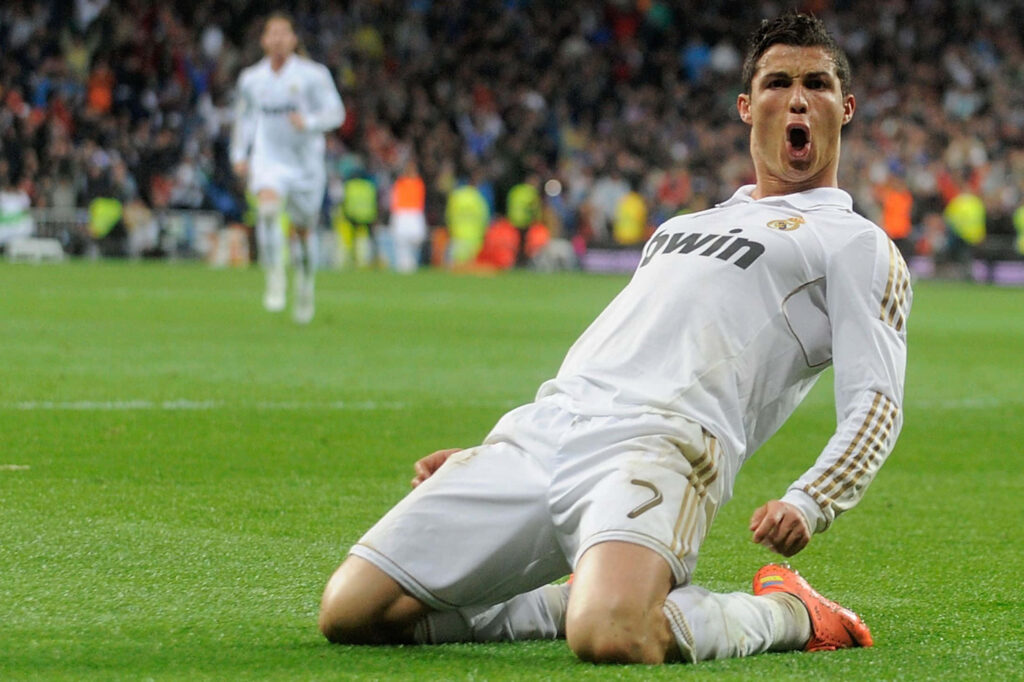 Dynamic Cristiano Ronaldo Celebration Wallpaper Background