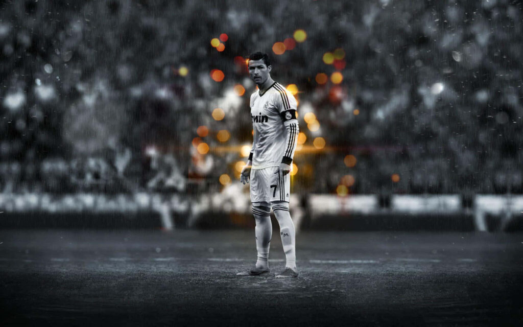 Stunning Cristiano Ronaldo Wallpaper: Dynamic Field Pose & Bokeh