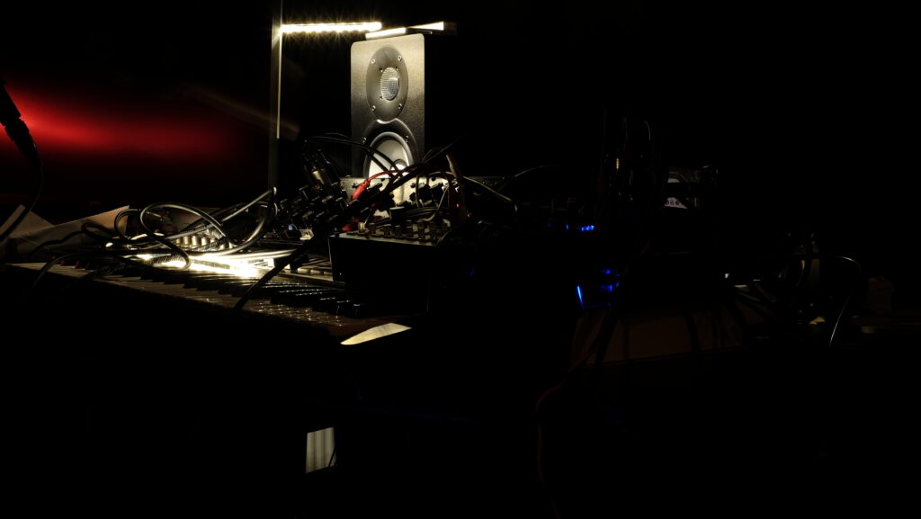 Dramatic DJ Console Wallpaper: Immersive Music Production Background