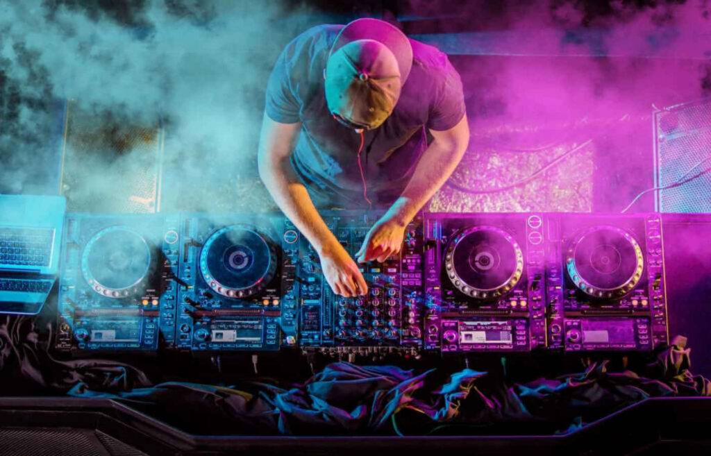 Vibrant DJ Wallpaper: Colorful Neon Lights & Energetic Party Vibe