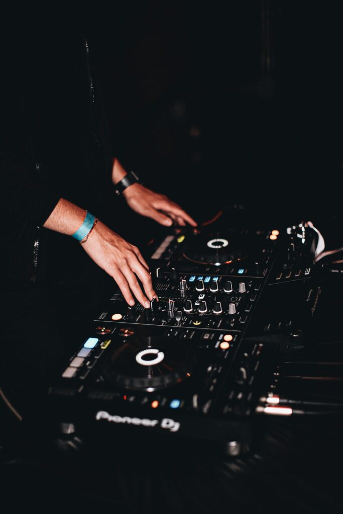 Dynamic DJ Action Wallpaper: Immersive Music Scene Background