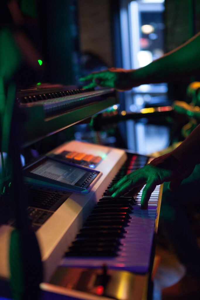 Dynamic DJ Synthesizer Wallpaper: Moody Lighting & Music Vibes