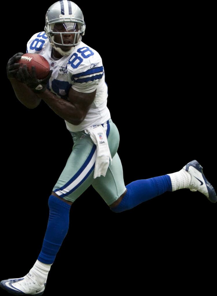 Dallas Cowboys Player Mid-Air Catch - Dynamic Sports Wallpaper