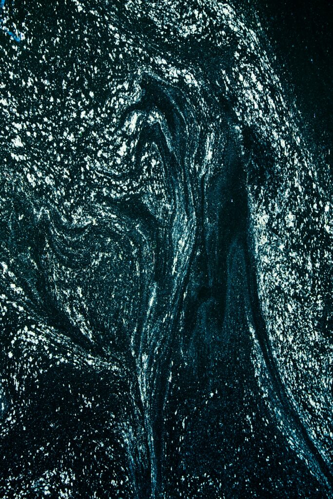 Dynamic Dark Wallpaper with Textured Patterns - High-Resolution Background