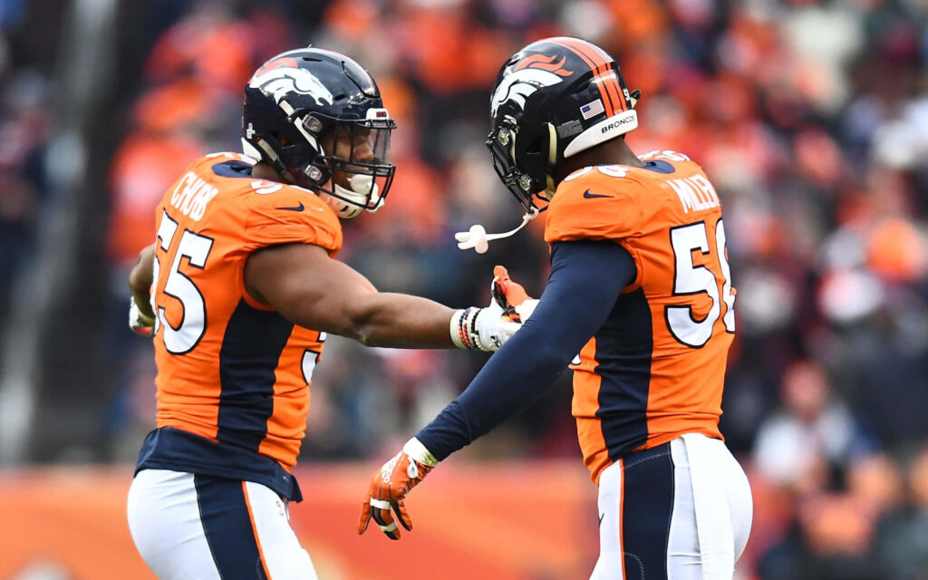 Dynamic Denver Broncos Wallpaper: Chubb & Miller's Team Spirit
