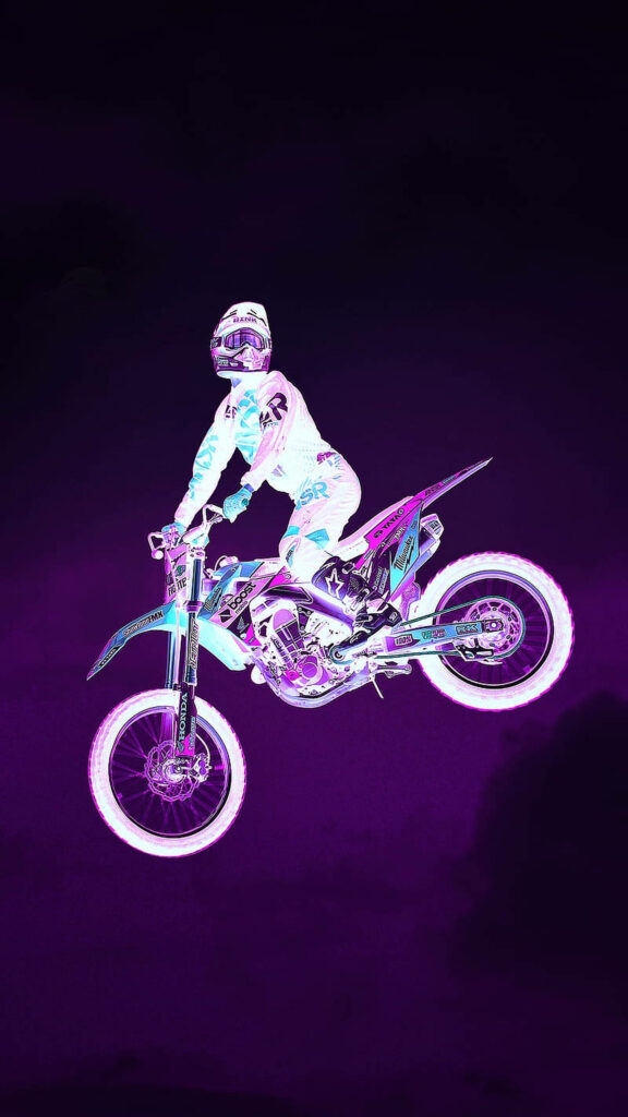 Dirt bike rider mid-air with neon cyan and lavender highlights on deep purple background wallpaper