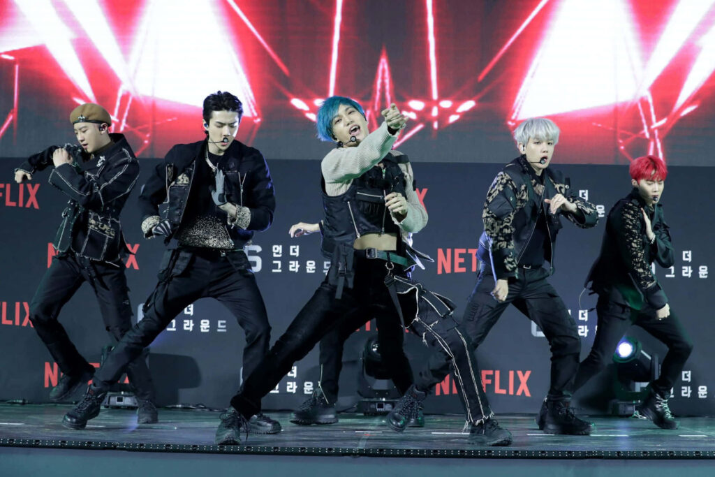 Dynamic EXO Wallpaper: K-POP Group on Stage - Perfect for Fans!