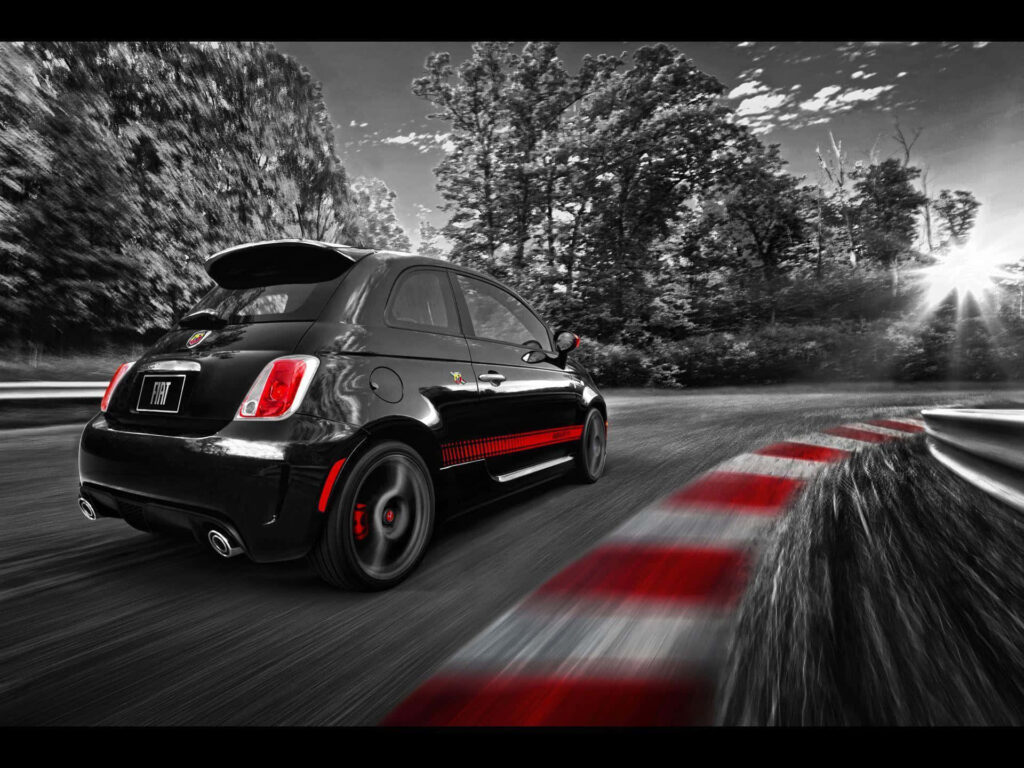 The Thrilling Red Abarth: Unleashing Power on a Captivating Journey Wallpaper