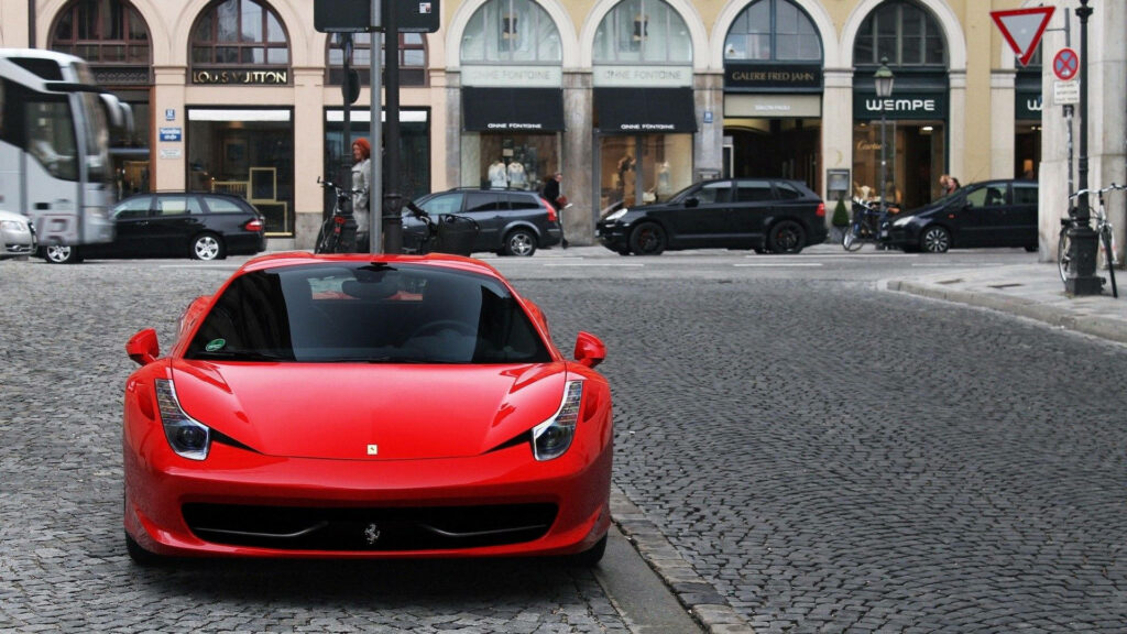 Unleashing the Bold Majesty: A Glimpse into Ferrari's Thrilling F430 in Full Acceleration Wallpaper