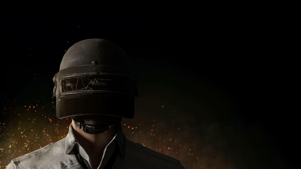 Bold Warrior's Vibrant Encounter: An Immersive Pubg Helmet Character Amidst Radiant Orange Particles Wallpaper