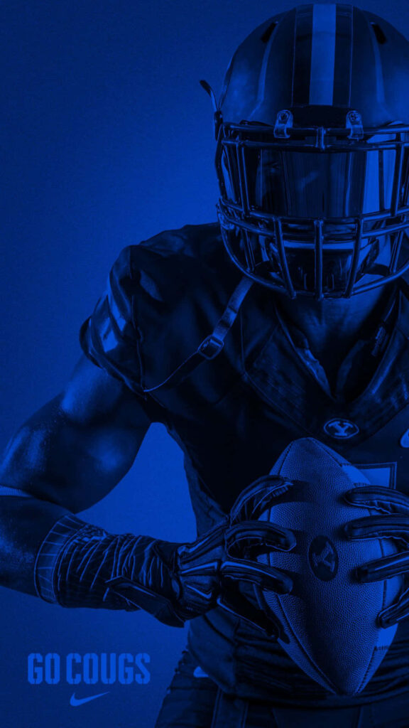 Dynamic Football Wallpaper: Player in Blue with Go Cougs & Nike