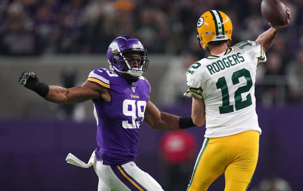 Intense Football Wallpaper: Hunter vs. Rodgers Action Moment