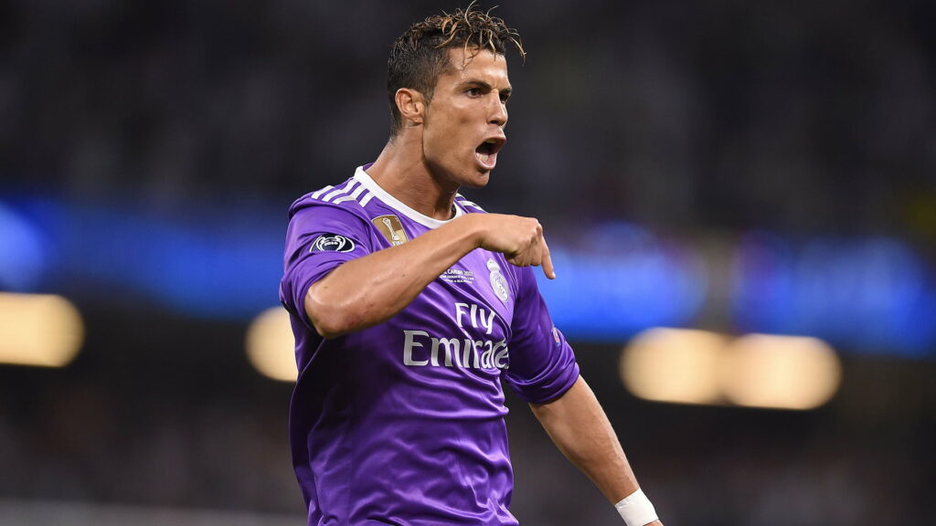 Unstoppable Football Genius: Captivating HD Wallpaper Background of Cristiano Ronaldo in Action