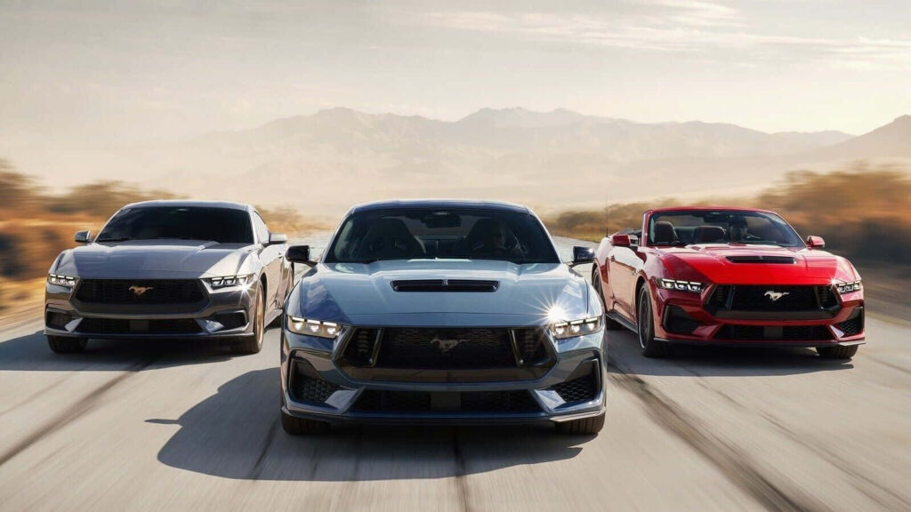Ford Mustang Wallpaper: 3 Models in Motion Against Scenic Backdrop