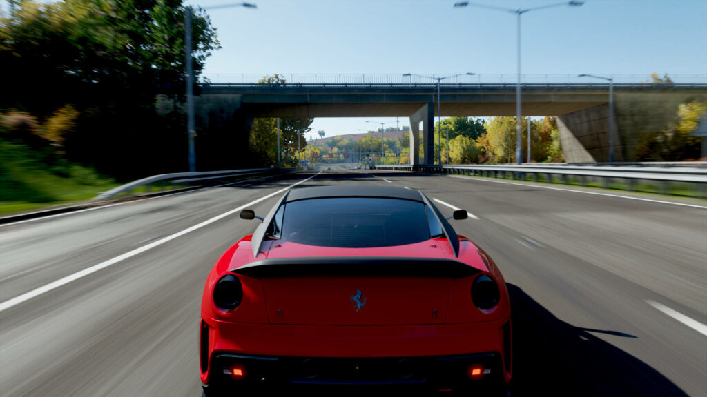 Red Ferrari Racing in Forza Horizon 4: Scenic Highway Background Wallpaper