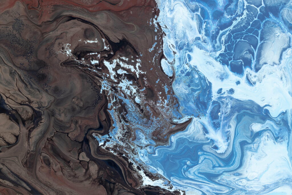 Abstract Fusion: Vibrant Black and Blue Paint Stains - Captivating 4K Wallpaper Background