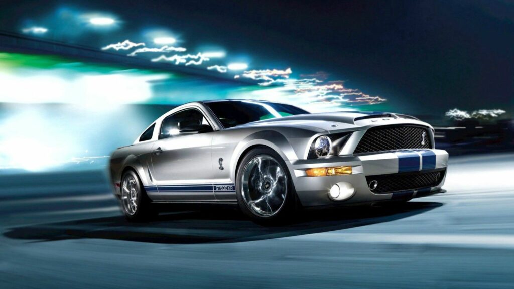 Dynamic Gray Ford Mustang Shelby GT500 Wallpaper in Motion