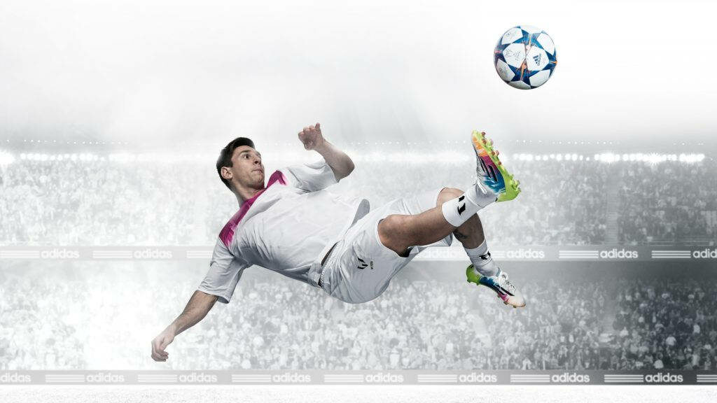 Dynamic HD Wallpaper: Man Kicking Football in Action-Packed Stadium