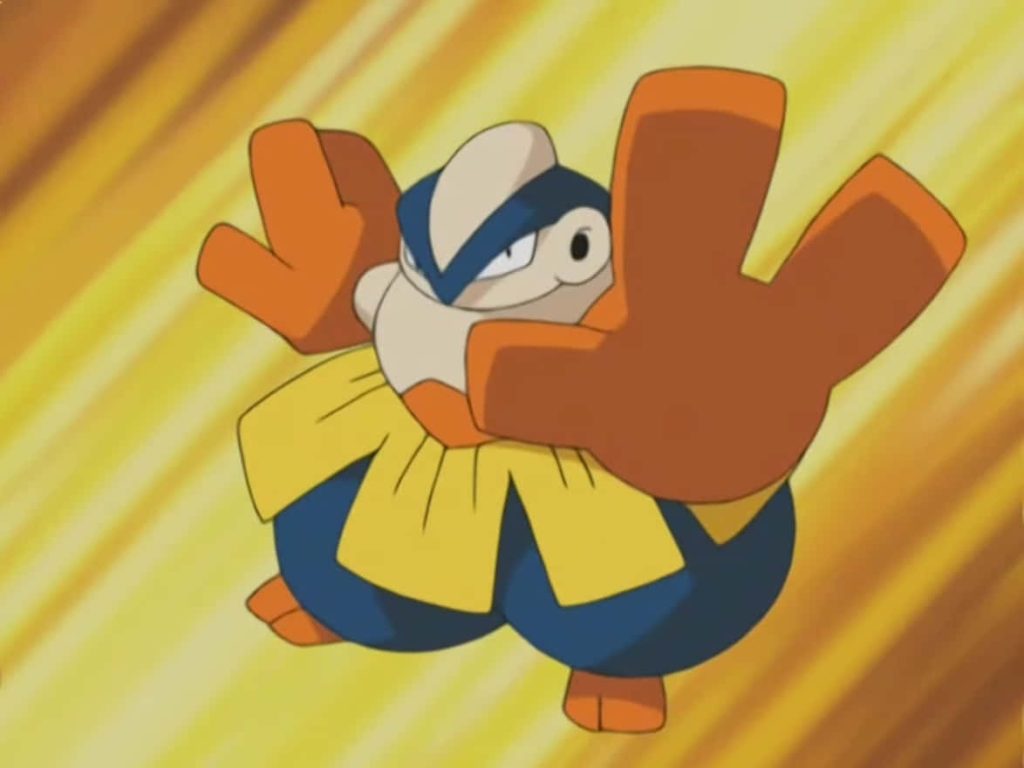 Dynamic Hariyama Fighting Pokémon striking powerful pose with large orange hands on yellow background Wallpaper