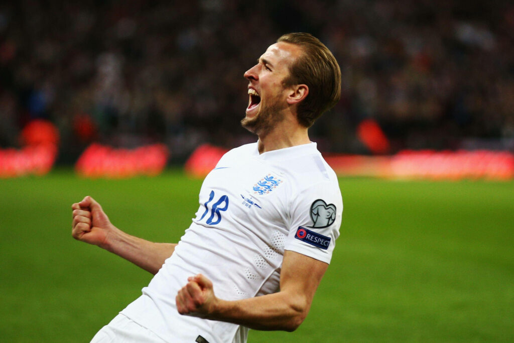 Dynamic Harry Kane Goal Celebration - England Jersey Wallpaper