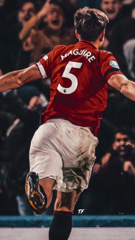 Dynamic Harry Maguire Football Wallpaper: Triumph & Determination
