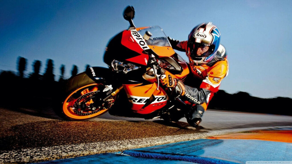 Dynamic Honda Racing Wallpaper: Repsol Motorcycle in Action