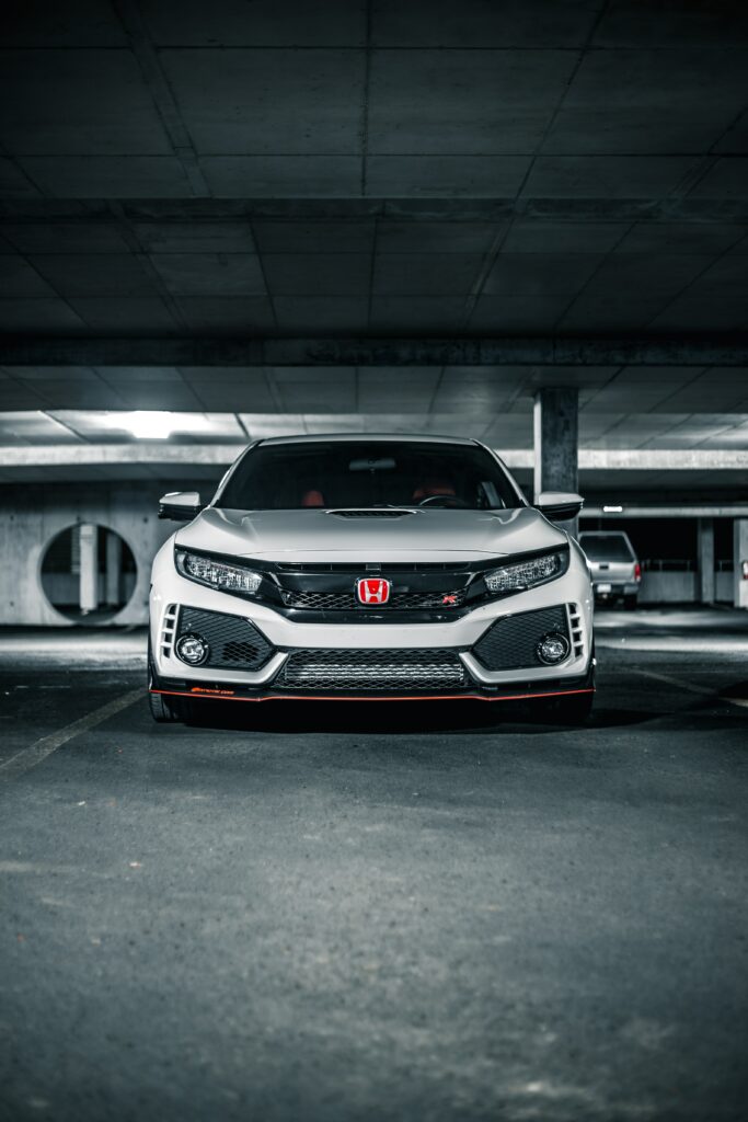 Stunning Honda Type R Front View in Dimly Lit Garage Wallpaper