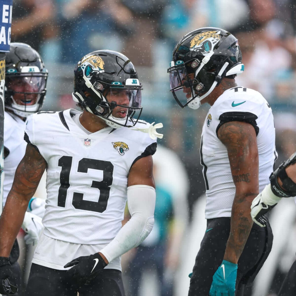 Dynamic Jacksonville Jaguars Wallpaper: Kirk & Teammates in Action
