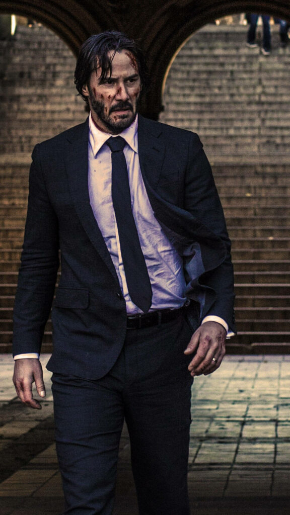 Keanu Reeves as John Wick: Intense Dynamic Wallpaper Background