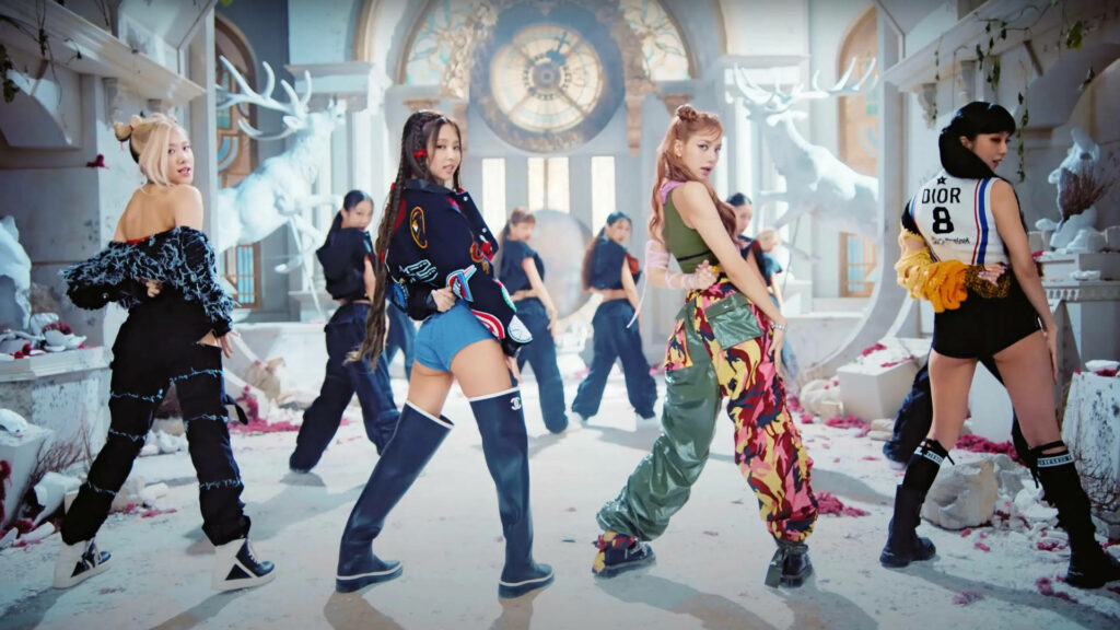 Vibrant K-Pop Trio Wallpaper: Energetic Stage Performance Background