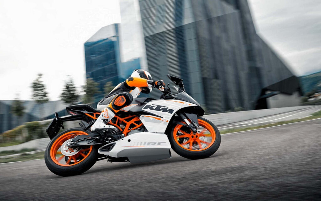 Dynamic KTM Motorcycle Wallpaper: Power & Precision on Track