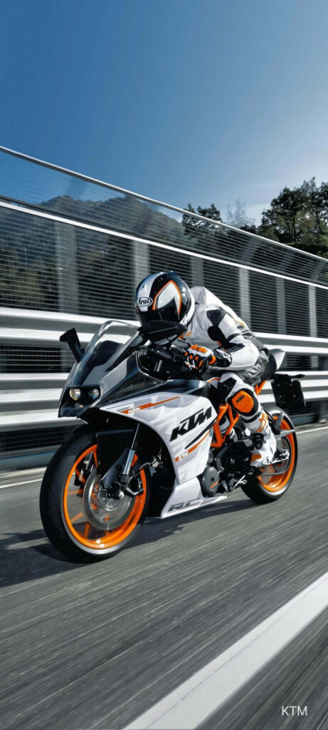 Dynamic KTM Motorcycle Wallpaper: Speedy Orange-White Design