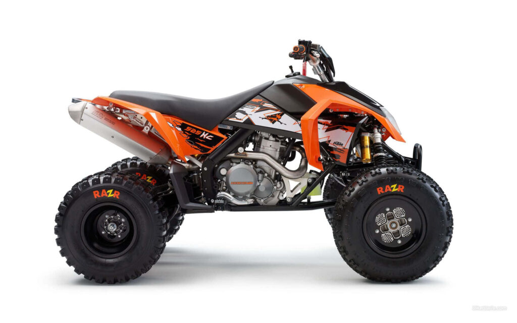 Dynamic KTM Racing Quad Bike Wallpaper - Off-Road Adventure Background