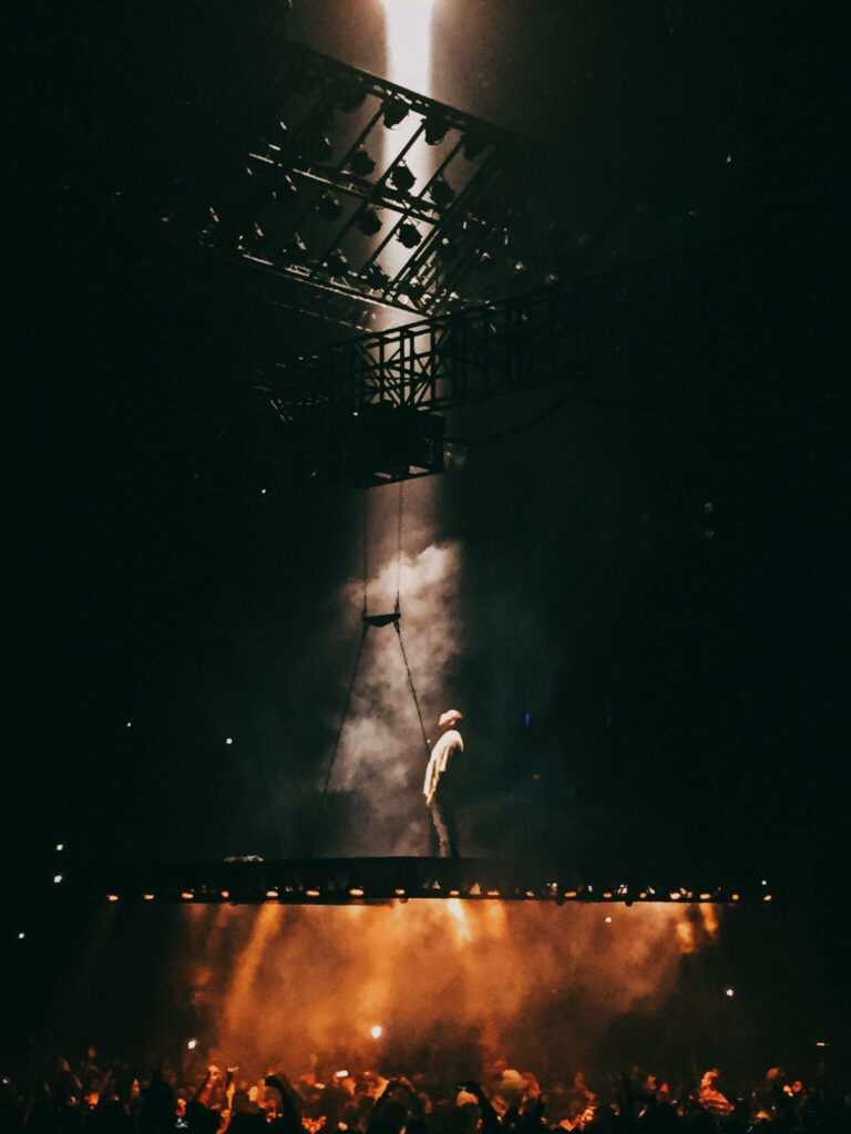 Stunning Kanye West Saint Pablo Tour Wallpaper - Dramatic Lighting